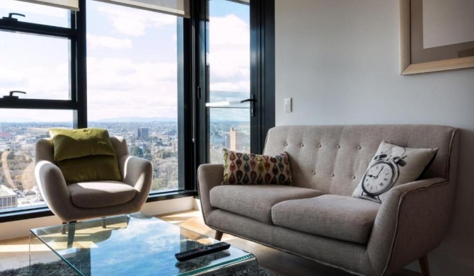 Owen · Soaring City Views Central Location